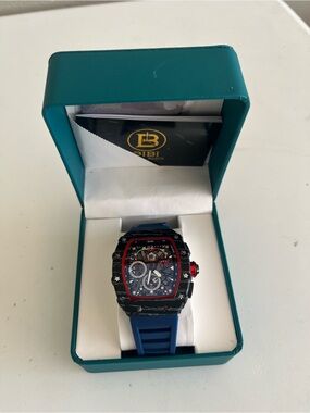 BiBi Blue Strap Men's Skeleton Dial Watch with Red Accents